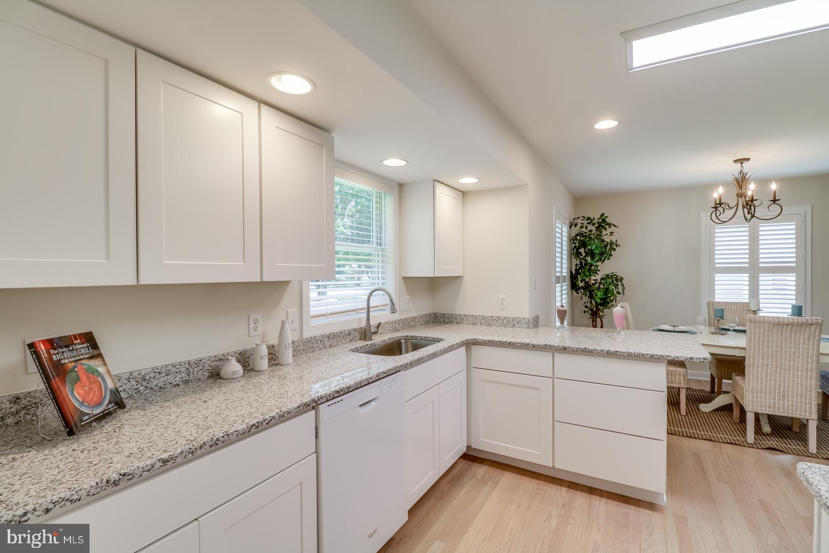 143 Cornwall Road Rehoboth Beach, DE 19971 - Photo 11 of 30 New white kitchen open to dining.