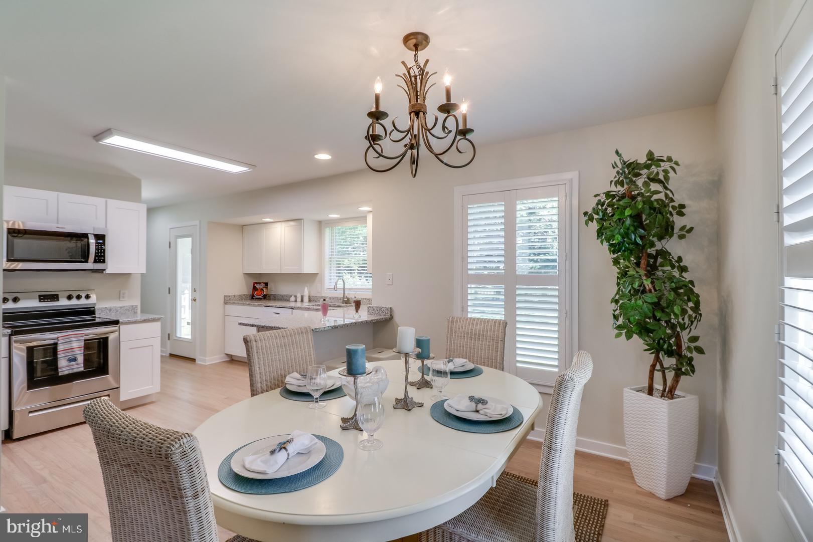 143 Cornwall Road Rehoboth Beach, DE 19971 - Photo 6 of 30 Dining open to kitchen.