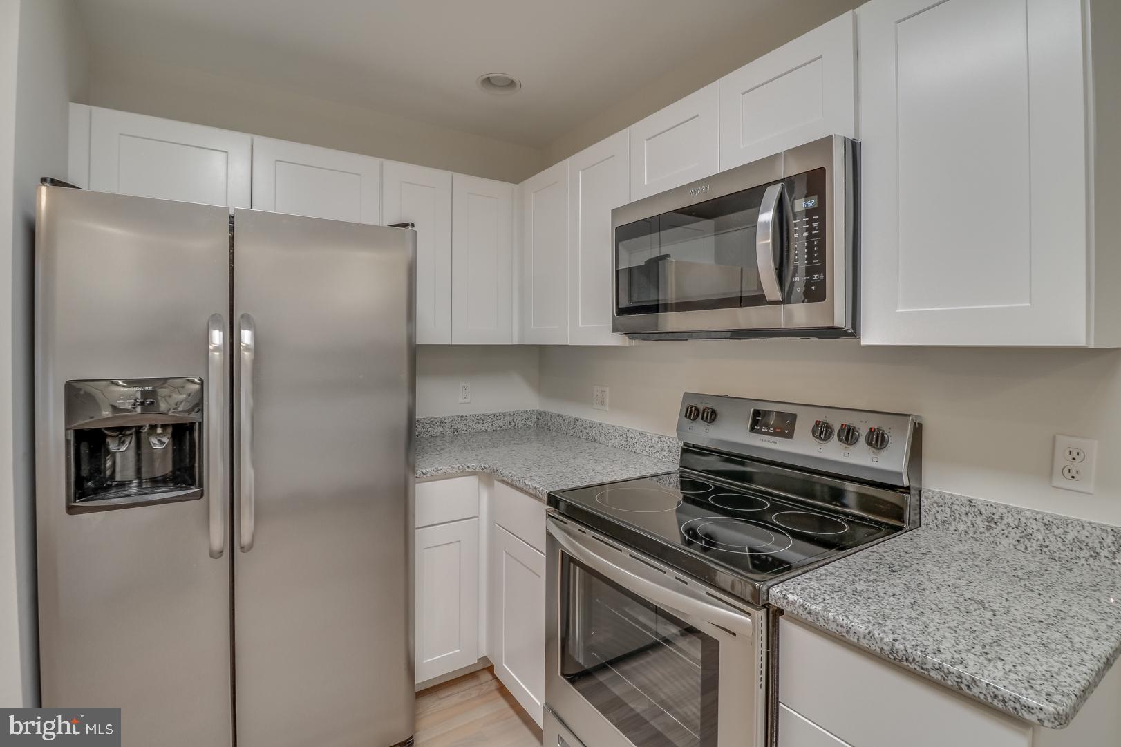 143 Cornwall Road Rehoboth Beach, DE 19971 - Photo 9 of 30 New cabinets, new stainless steel appliances.