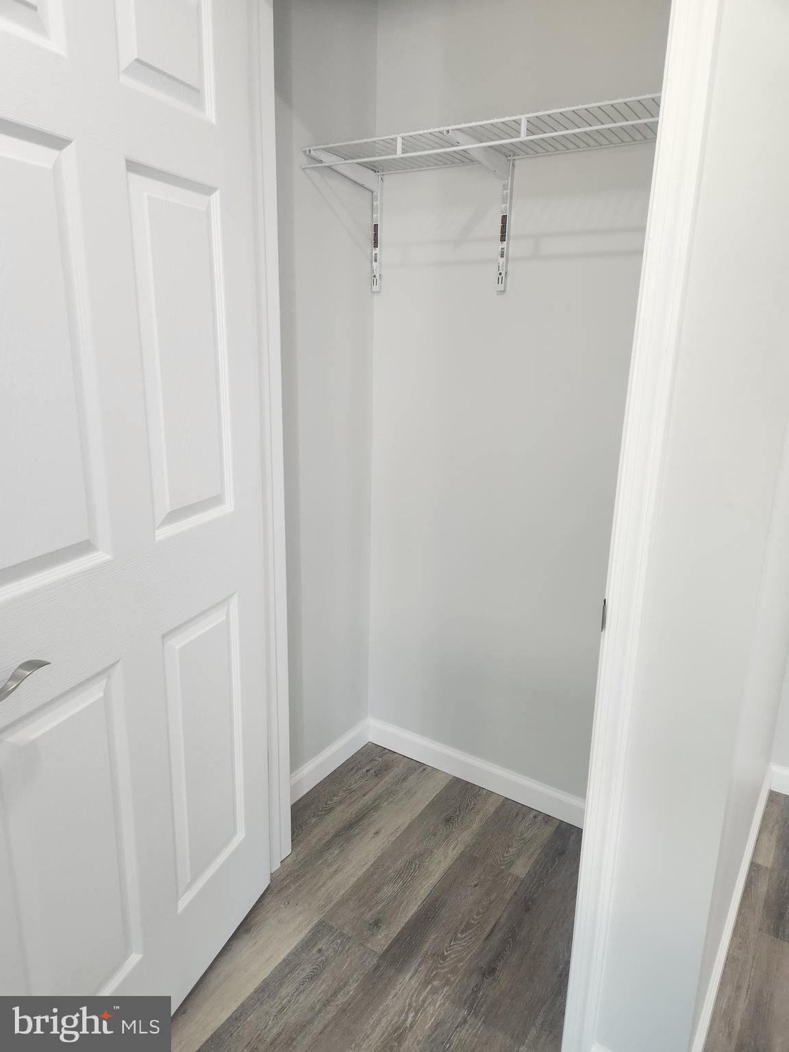 65 Woods Edge Road, Unit 18 Fort Ashby, WV 26719 - Photo 4 of 12 a view of an empty walk in closet