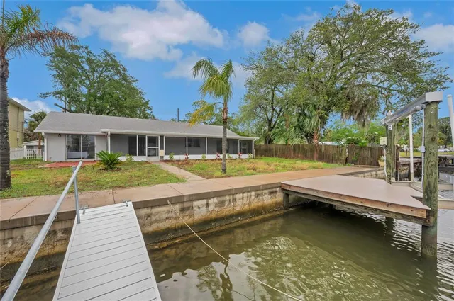 a view of a house with swimming pool