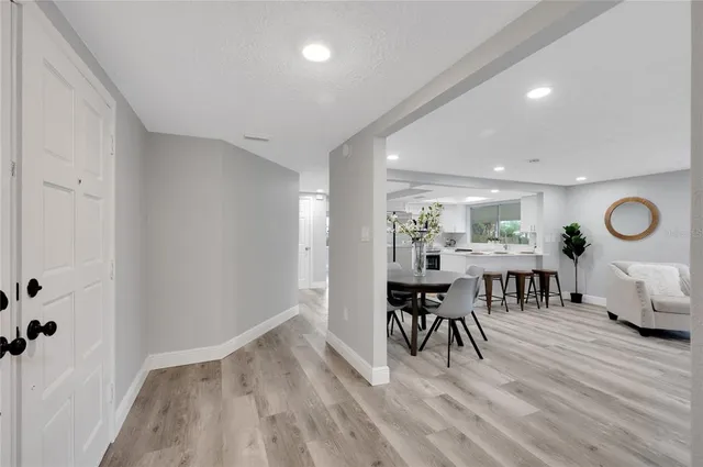 a living room with furniture and a table