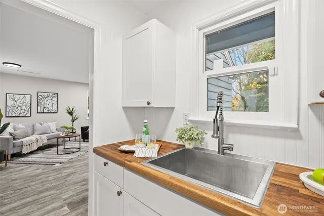 a kitchen with a sink and a window