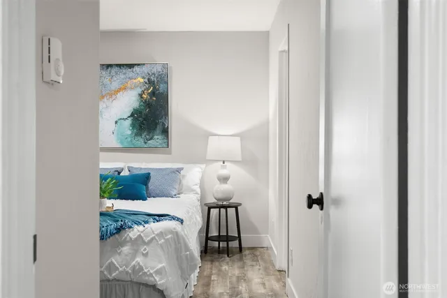 a view of a bedroom from a hallway