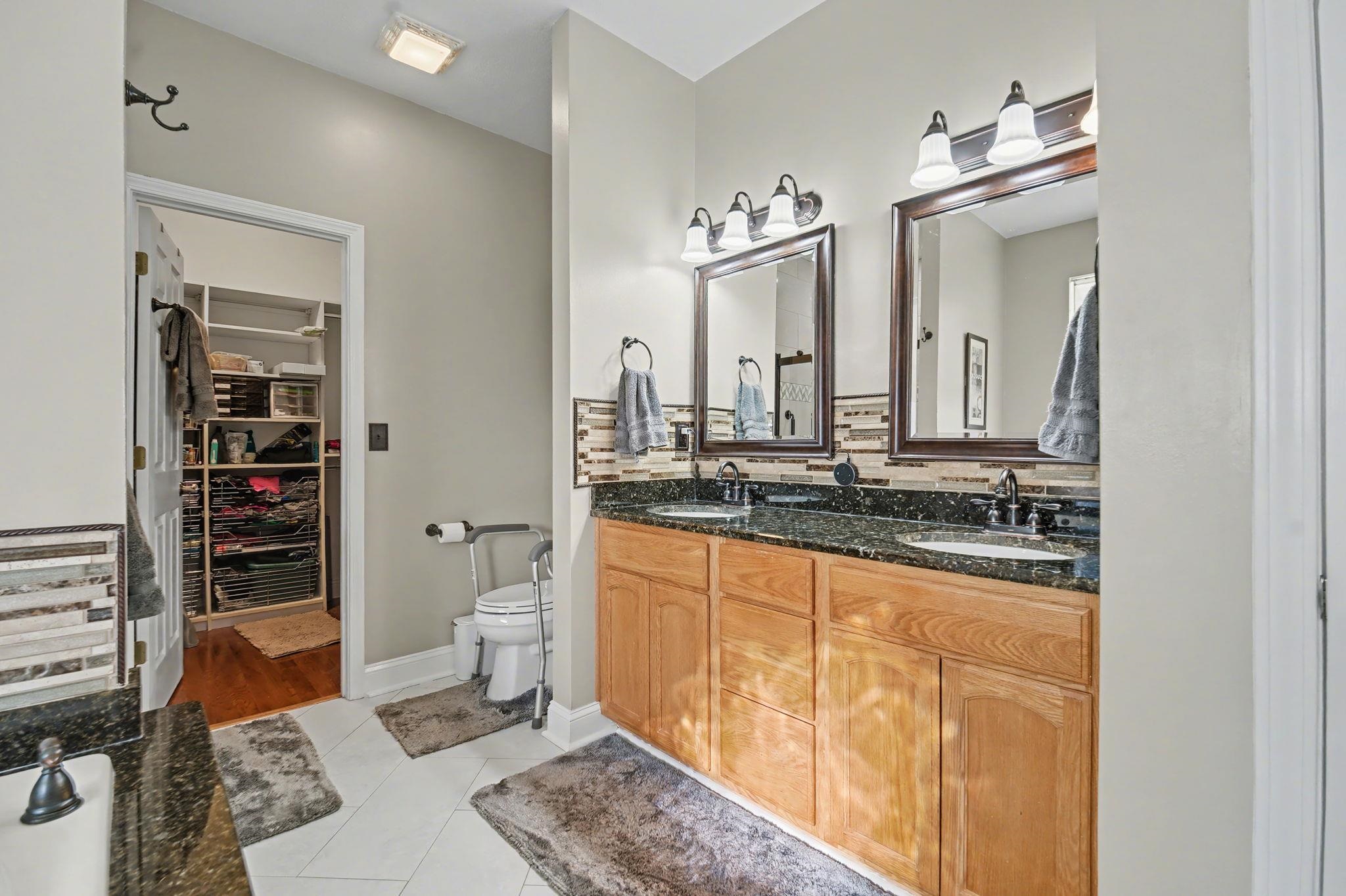 629 Cottontail Trail Myrtle Beach, SC 29588 - Photo 21 of 40 Full bathroom with a spacious closet, double vanity, and light tile patterned floors