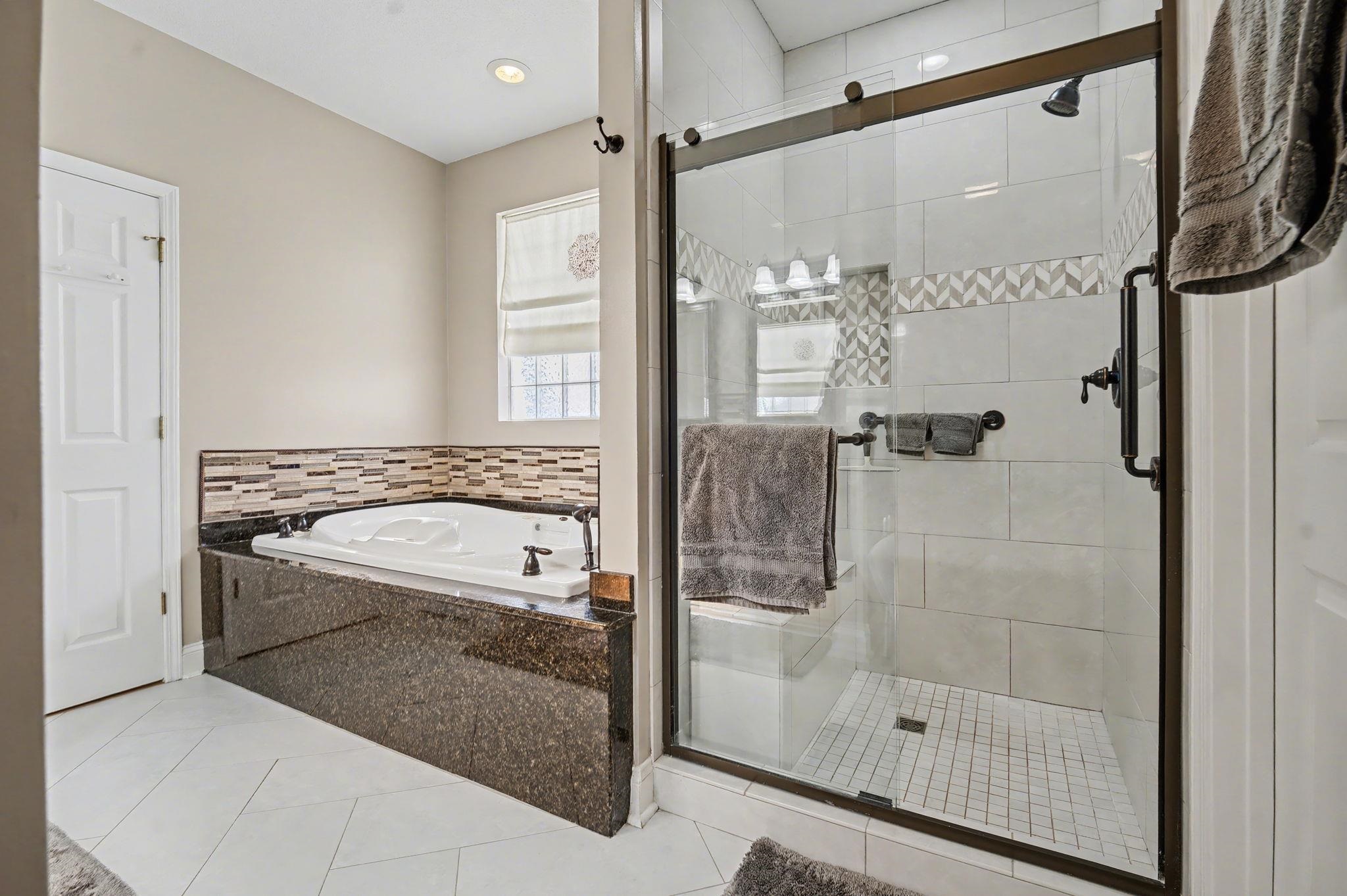 629 Cottontail Trail Myrtle Beach, SC 29588 - Photo 22 of 40 Full bath with a stall shower, a bath, and tile patterned flooring