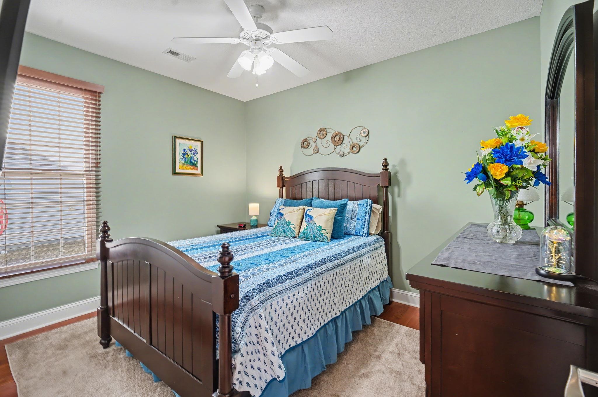 629 Cottontail Trail Myrtle Beach, SC 29588 - Photo 24 of 40 Bedroom featuring a ceiling fan and wood finished floors