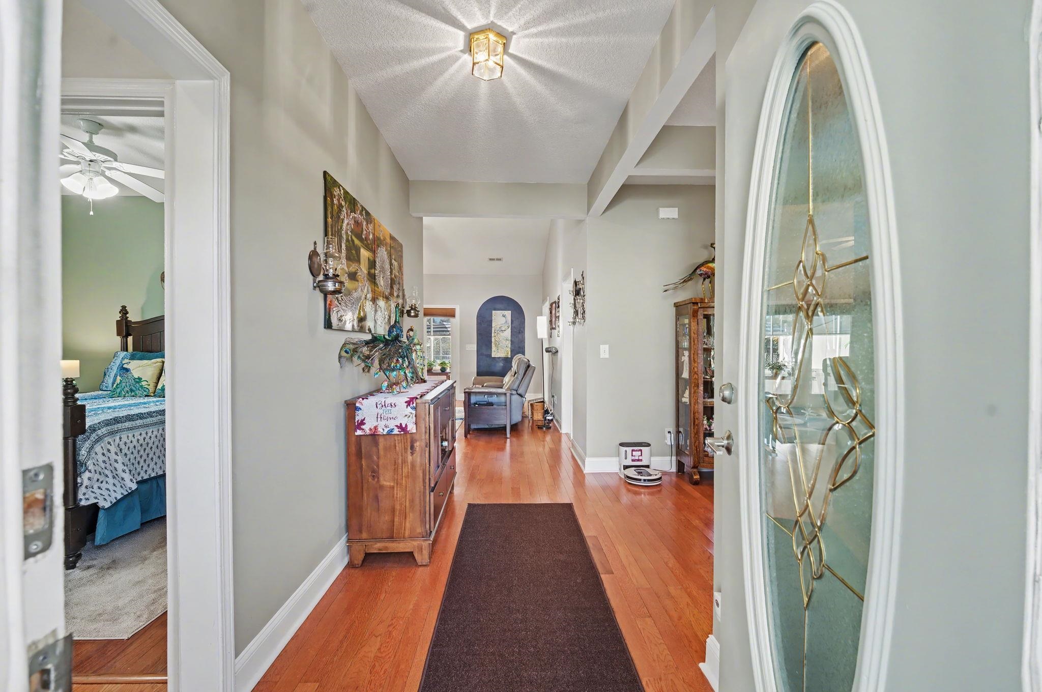 629 Cottontail Trail Myrtle Beach, SC 29588 - Photo 6 of 40 Entrance foyer with light wood-type flooring, arched walkways, and ceiling fan