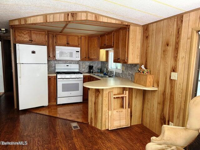 759 East North Main Road, Unit V8J Otis, MA 01253 - Photo 12 of 27 a kitchen with stainless steel appliances granite countertop a refrigerator a stove and a wooden floors
