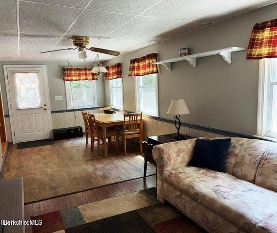 759 East North Main Road, Unit V8J Otis, MA 01253 - Photo 14 of 27 a living room with furniture and wooden floor