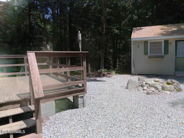 759 East North Main Road, Unit V8J Otis, MA 01253 - Photo 4 of 27 a view of a roof deck with wooden fence