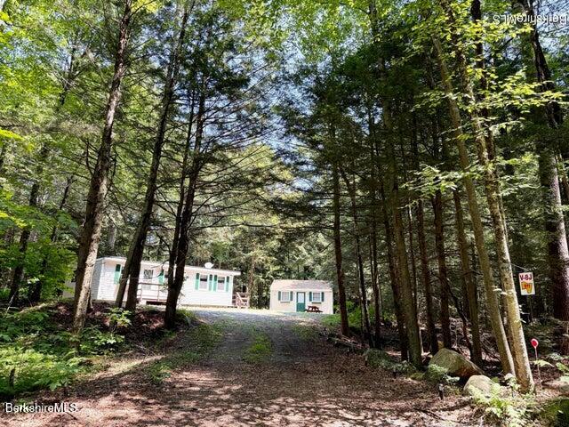 759 East North Main Road, Unit V8J Otis, MA 01253 - Photo 8 of 27 a view of house with a outdoor space