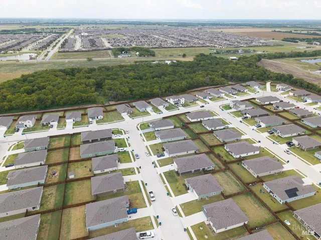 a view of a city with an ocean view