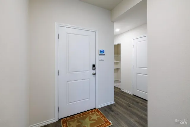 a view of bathroom with wooden floor