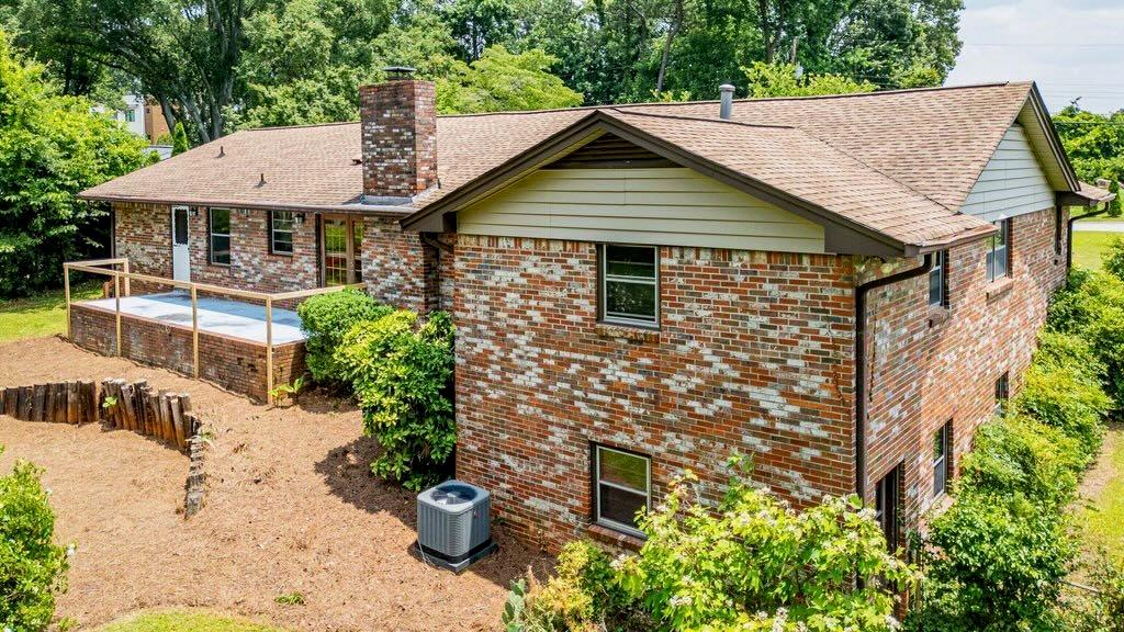 3854 Ridgewood Drive Southeast Smyrna, GA 30080 - Photo 33 of 40 a front view of a house with a yard