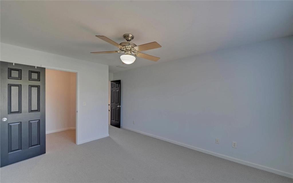 4286 Cami Way Northeast Buford, GA 30519 - Photo 26 of 39 wooden floor in an empty room