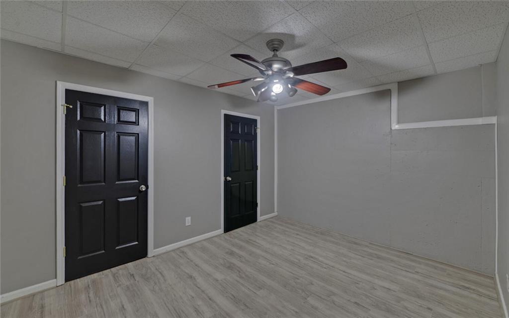 4286 Cami Way Northeast Buford, GA 30519 - Photo 31 of 39 a view of empty room with wooden floor