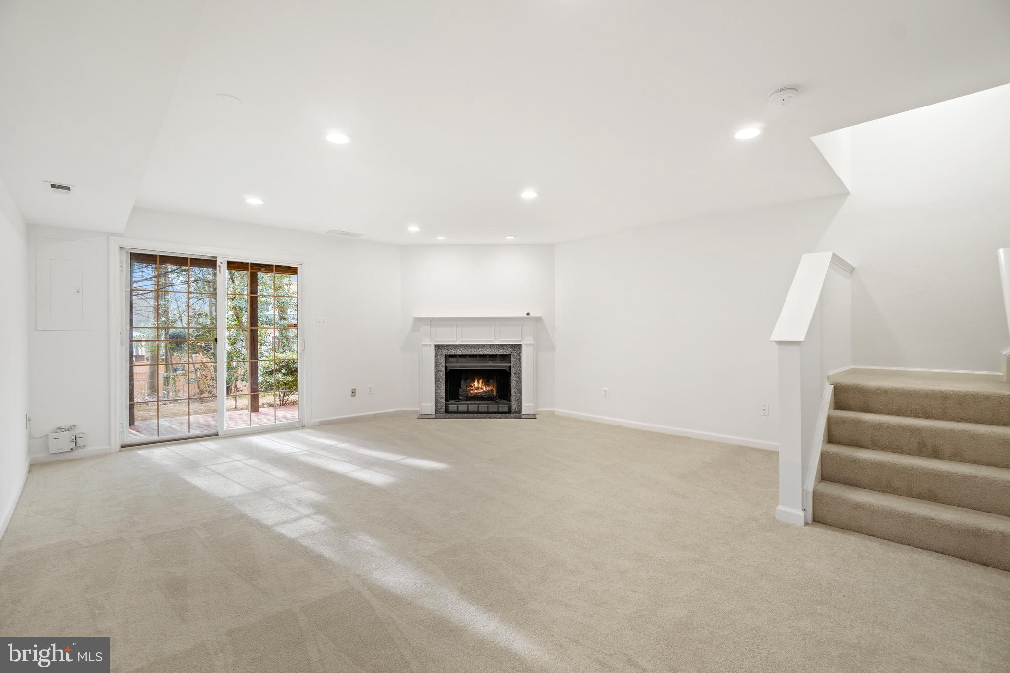 11463 Heritage Commons Way Reston, VA 20194 - Photo 23 of 33 Large Rec Room w/ Gas Fireplace & Walk out