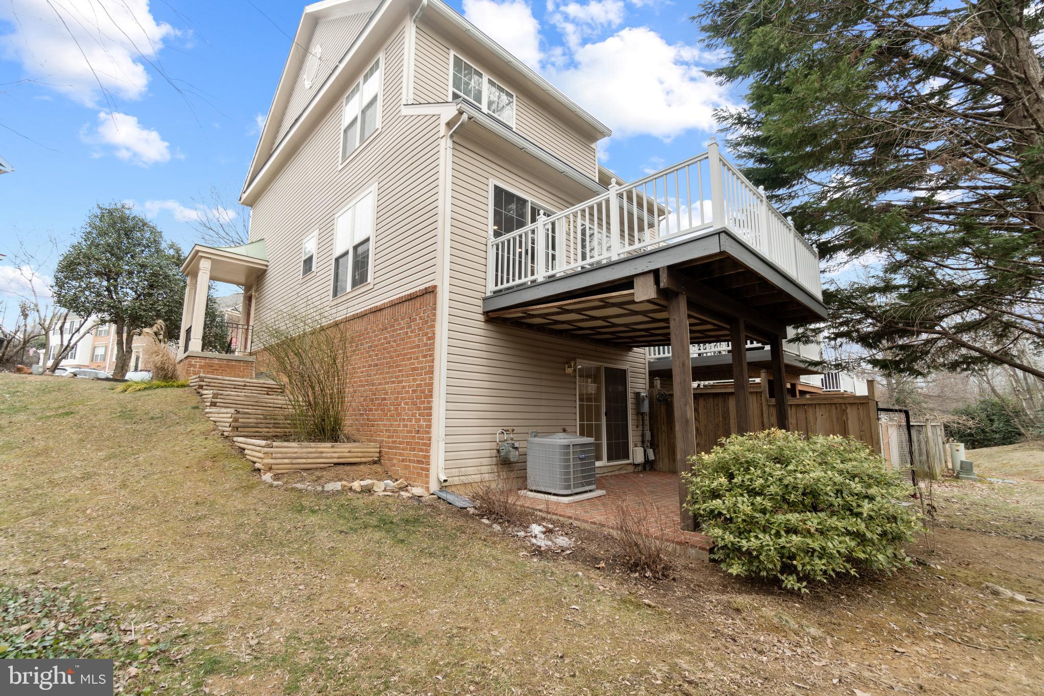 11463 Heritage Commons Way Reston, VA 20194 - Photo 30 of 33 Large Rear Brick Patio On Concrete Slab