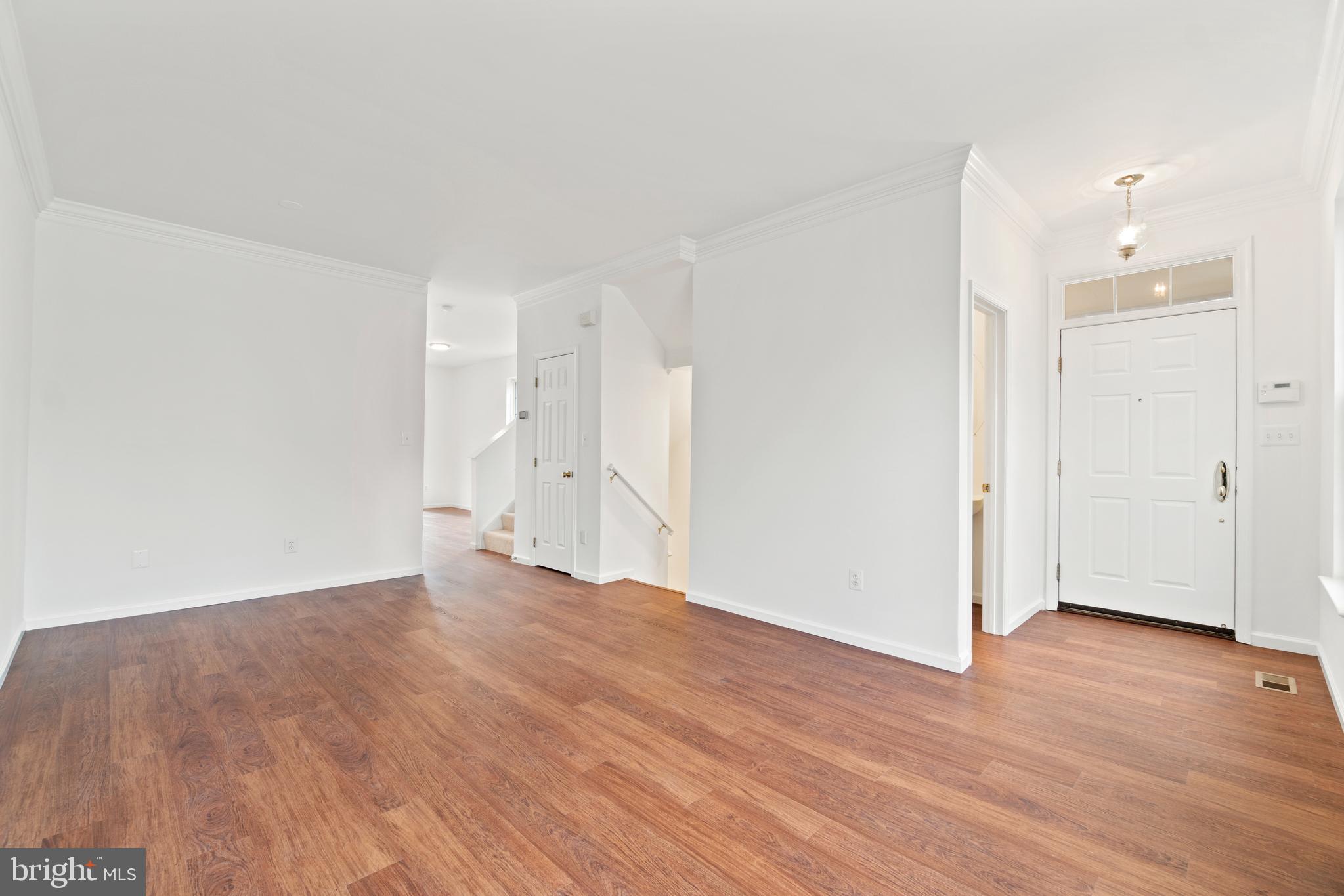 11463 Heritage Commons Way Reston, VA 20194 - Photo 3 of 33 Spacious Living Room with Brand New LVP Flooring