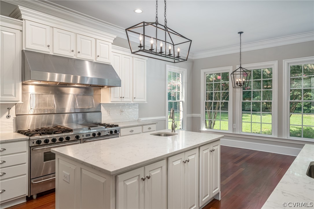 209 Castlerock Williamsburg, VA 23188 - Photo 11 of 31 a kitchen with a stove a sink and a window