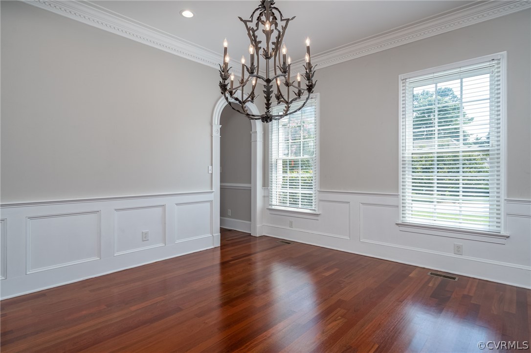 209 Castlerock Williamsburg, VA 23188 - Photo 13 of 31 a view of an empty room with wooden floor and a window