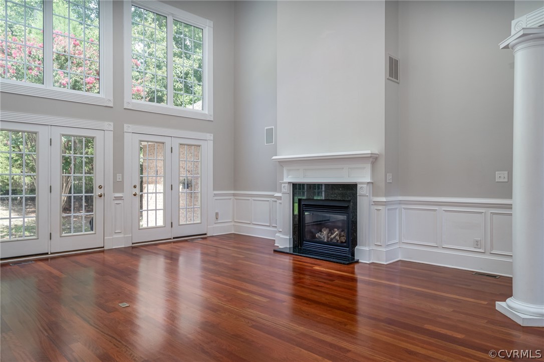 209 Castlerock Williamsburg, VA 23188 - Photo 15 of 31 a view of an empty room with wooden floor and a window