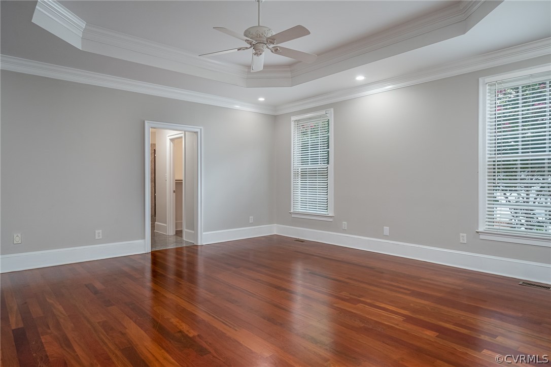 209 Castlerock Williamsburg, VA 23188 - Photo 17 of 31 a view of an empty room with wooden floor and a window