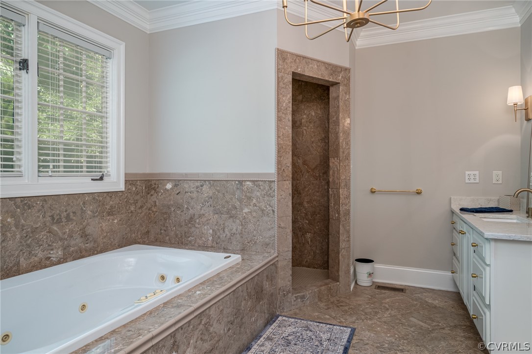 209 Castlerock Williamsburg, VA 23188 - Photo 26 of 31 a bathroom with a tub a sink and a window