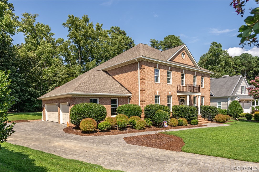 209 Castlerock Williamsburg, VA 23188 - Photo 29 of 31 a view of a white house with a yard and plants