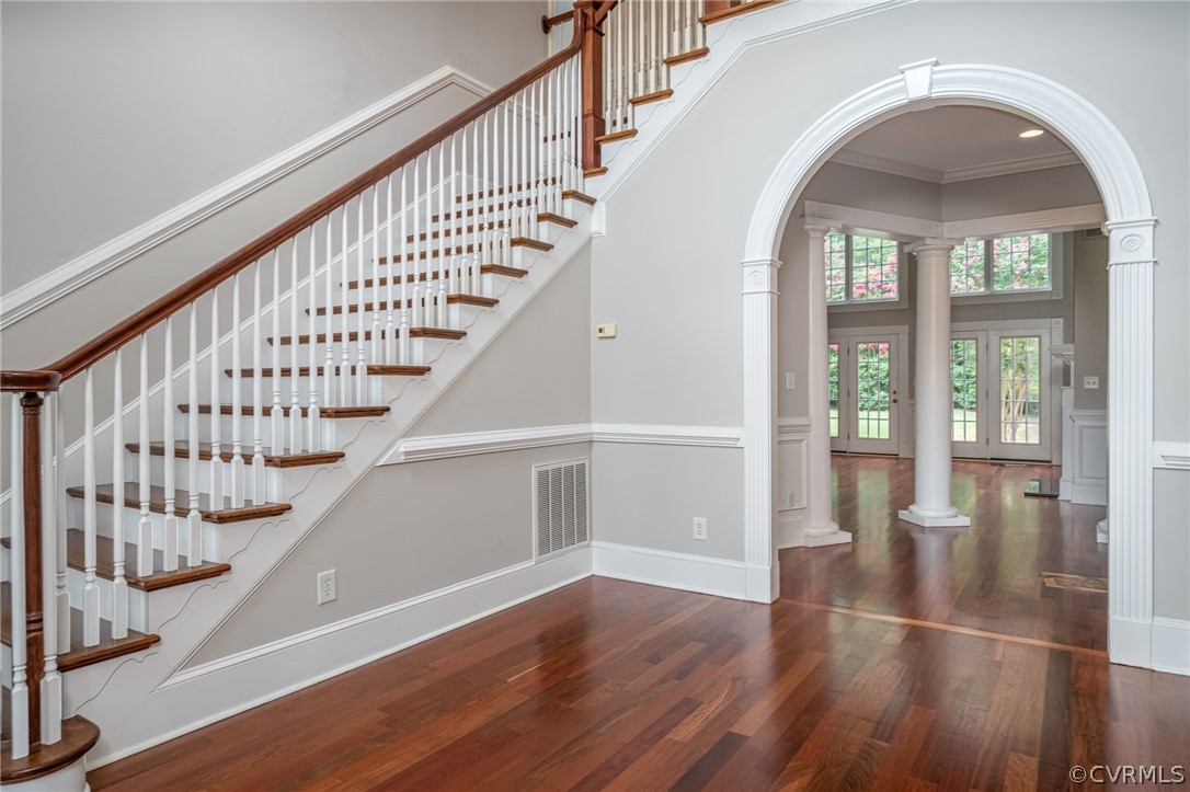 209 Castlerock Williamsburg, VA 23188 - Photo 4 of 31 a view of staircase with wooden floor and white walls