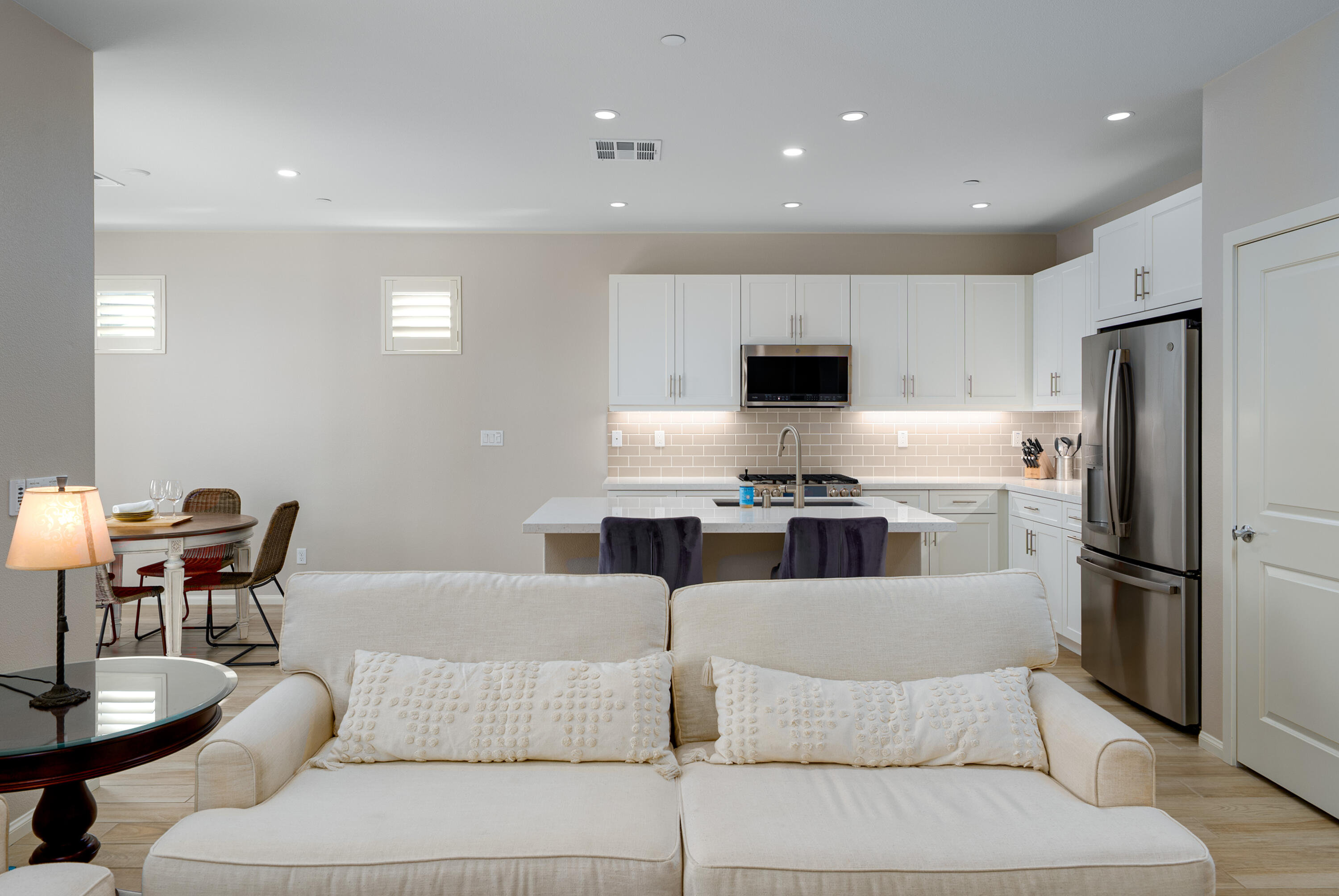 50380 Timber Creek Way Indio, CA 92201 - Photo 4 of 50 a living room with stainless steel appliances furniture a dining table and chairs