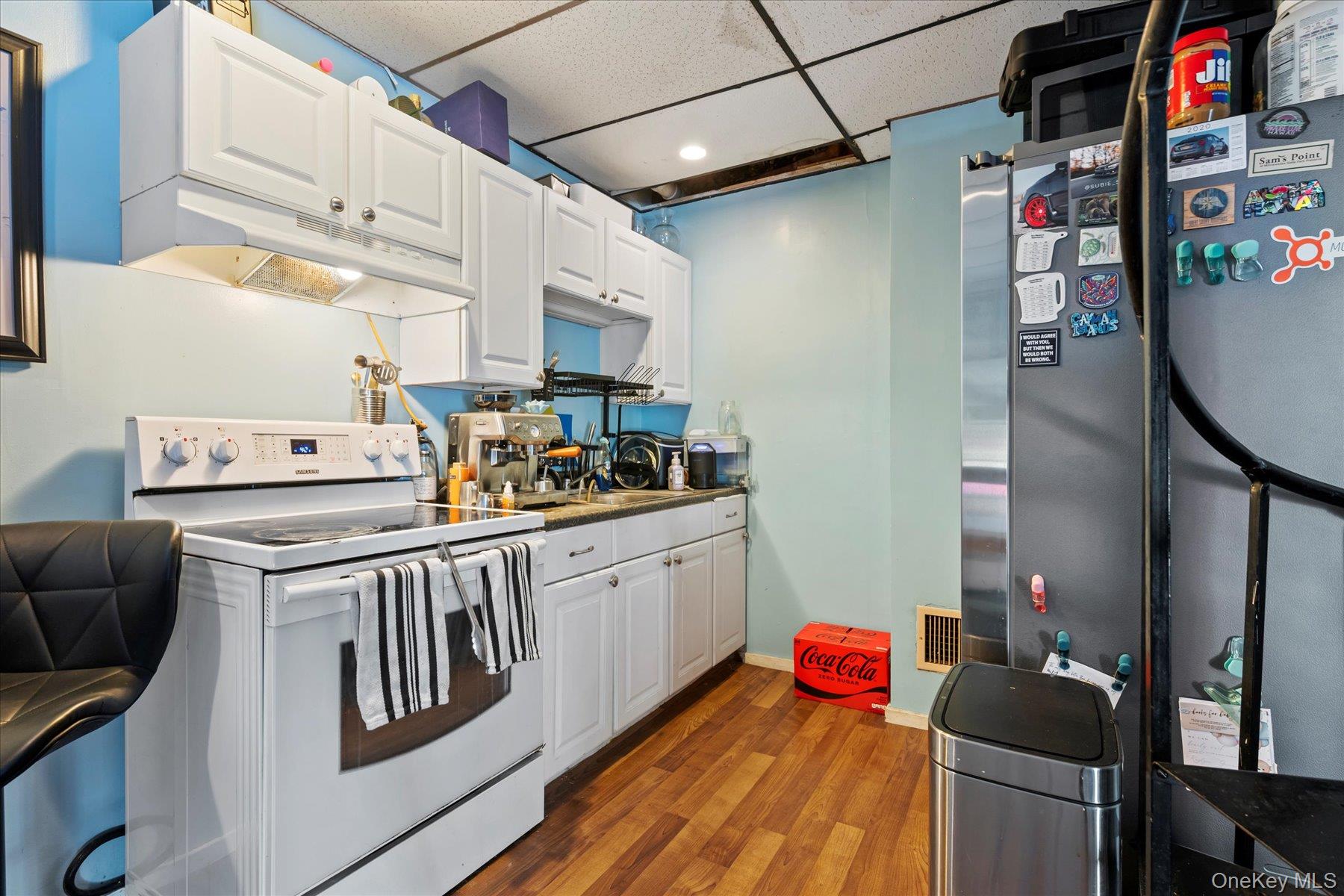 280 Moriches Road St. James, NY 11780 - Photo 21 of 39 a kitchen with stainless steel appliances granite countertop a sink and dishwasher