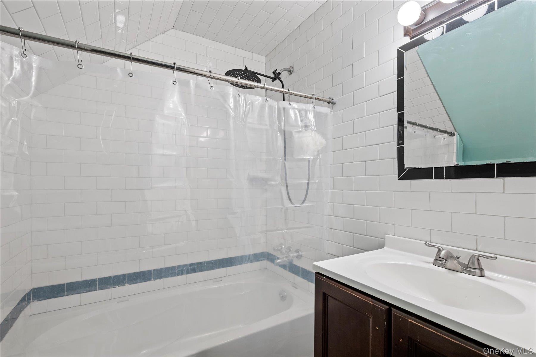 280 Moriches Road St. James, NY 11780 - Photo 24 of 39 a bathroom with a sink and a mirror