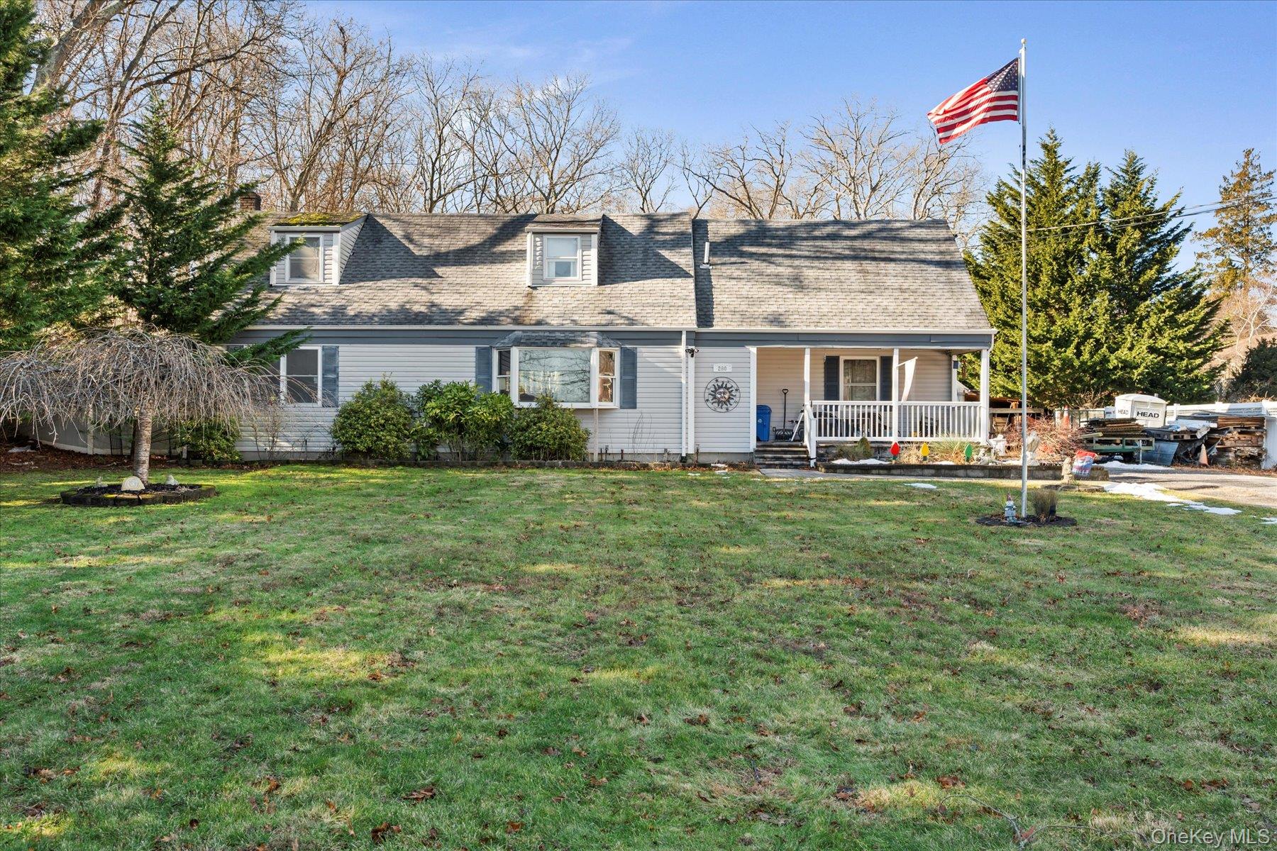 280 Moriches Road St. James, NY 11780 - Photo 29 of 39 front view of house with a yard