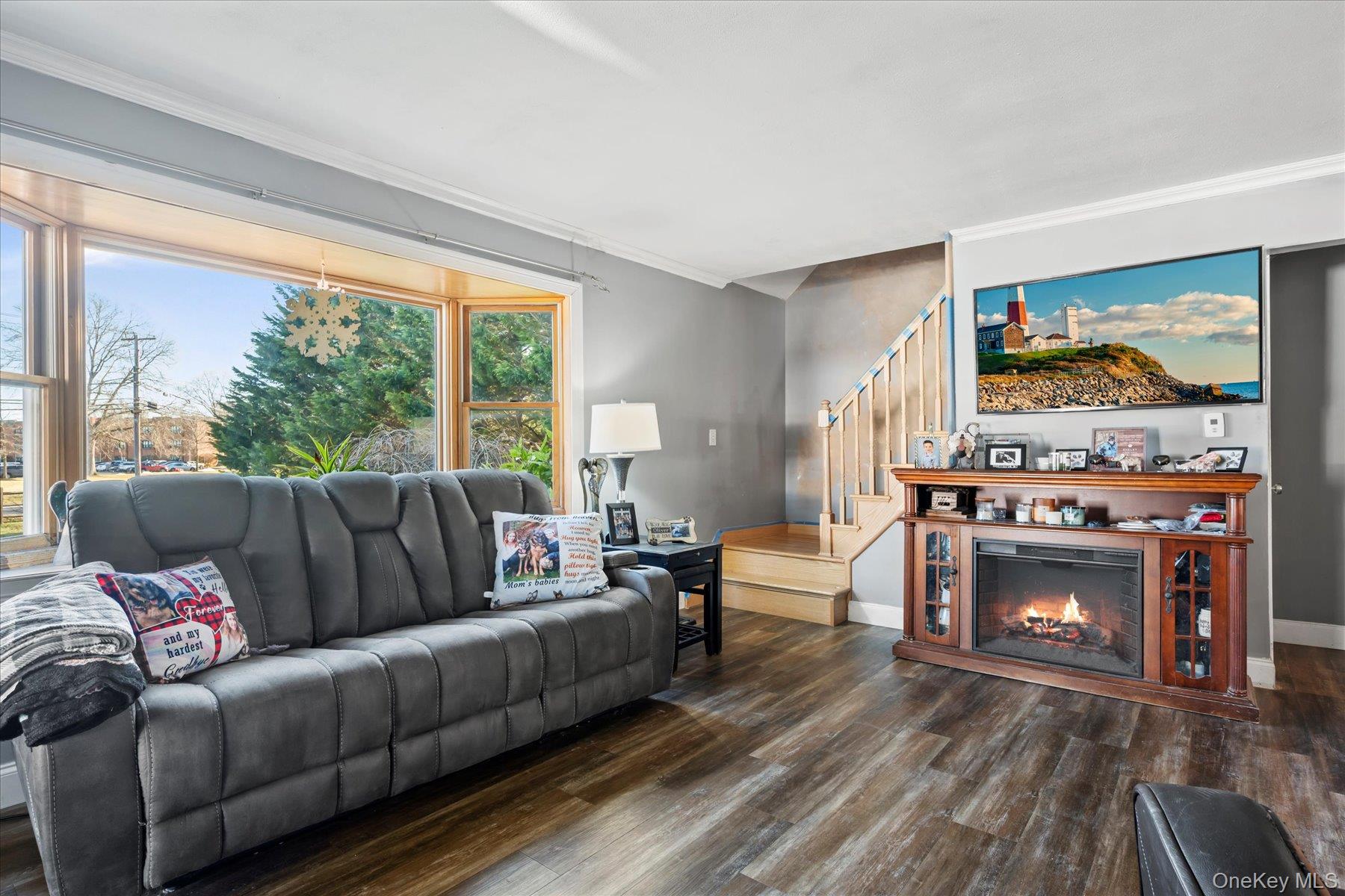 280 Moriches Road St. James, NY 11780 - Photo 4 of 39 a living room with furniture and a fireplace