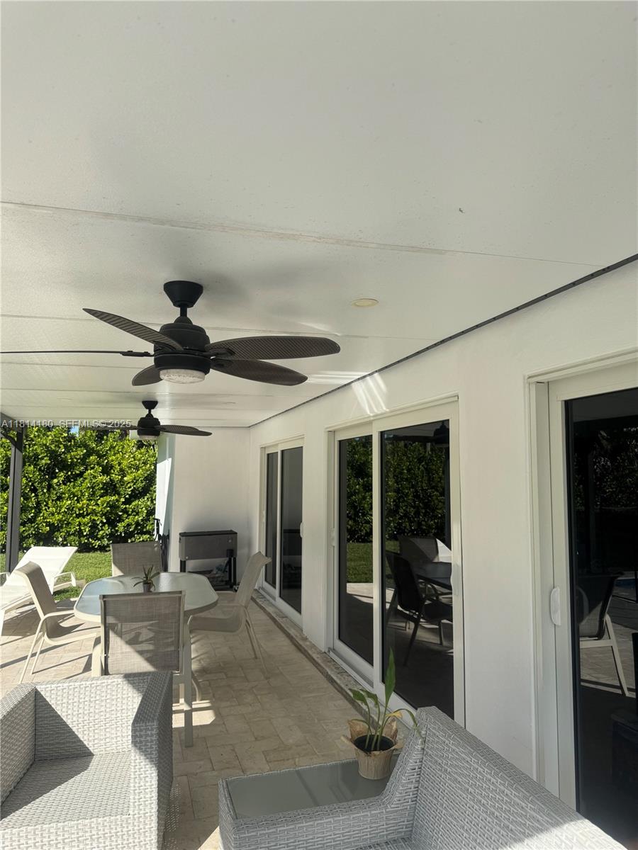 220 Northwest 130th Avenue Miami, FL 33182 - Photo 21 of 32 a living room with furniture and a window