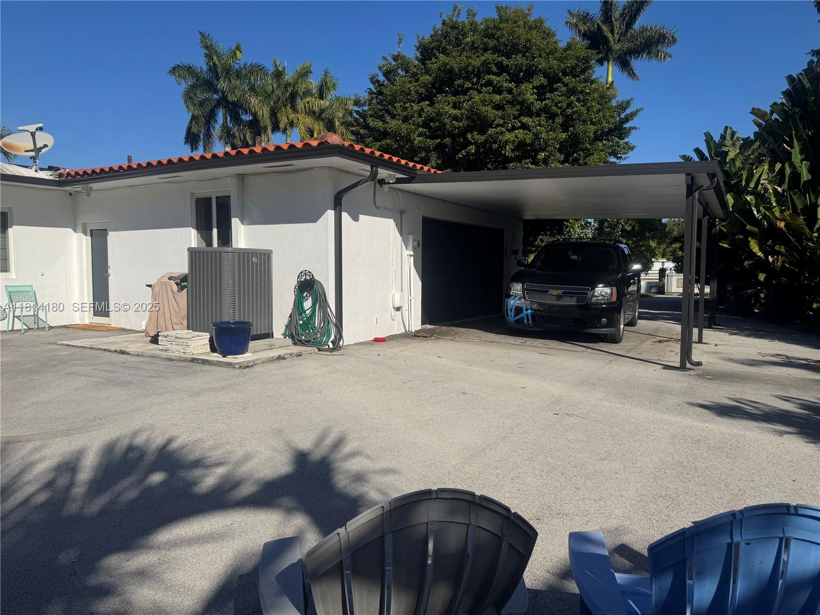 220 Northwest 130th Avenue Miami, FL 33182 - Photo 26 of 32 a view of a house with a patio