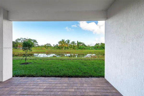 a view of a garden and basketball court