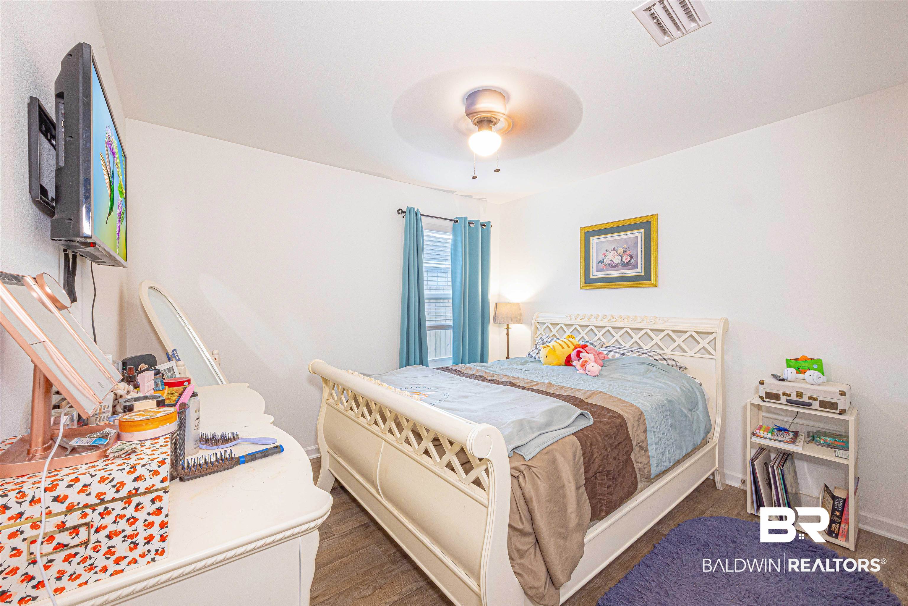 14843 Forsythia Loop Silverhill, AL 36576 - Photo 29 of 51 Bedroom featuring a ceiling fan and dark wood-type flooring