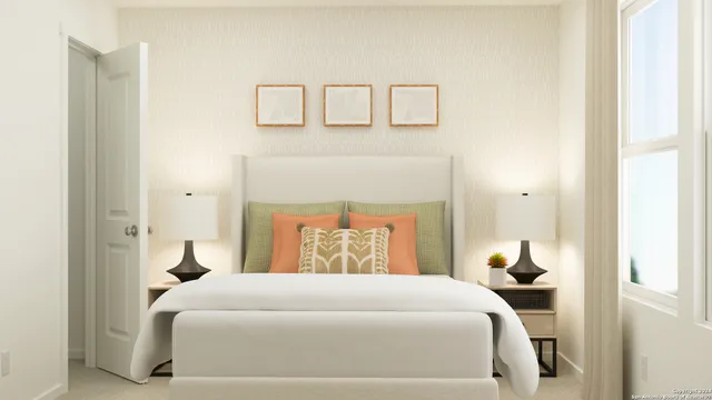 a bedroom with a bed and a night stand