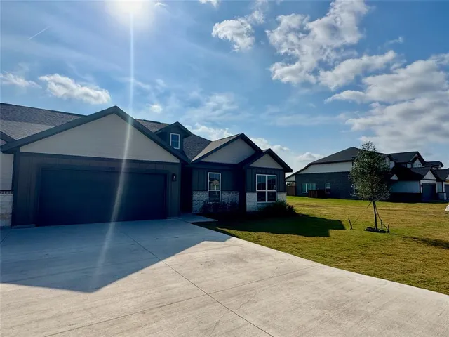 a house view with a garden space