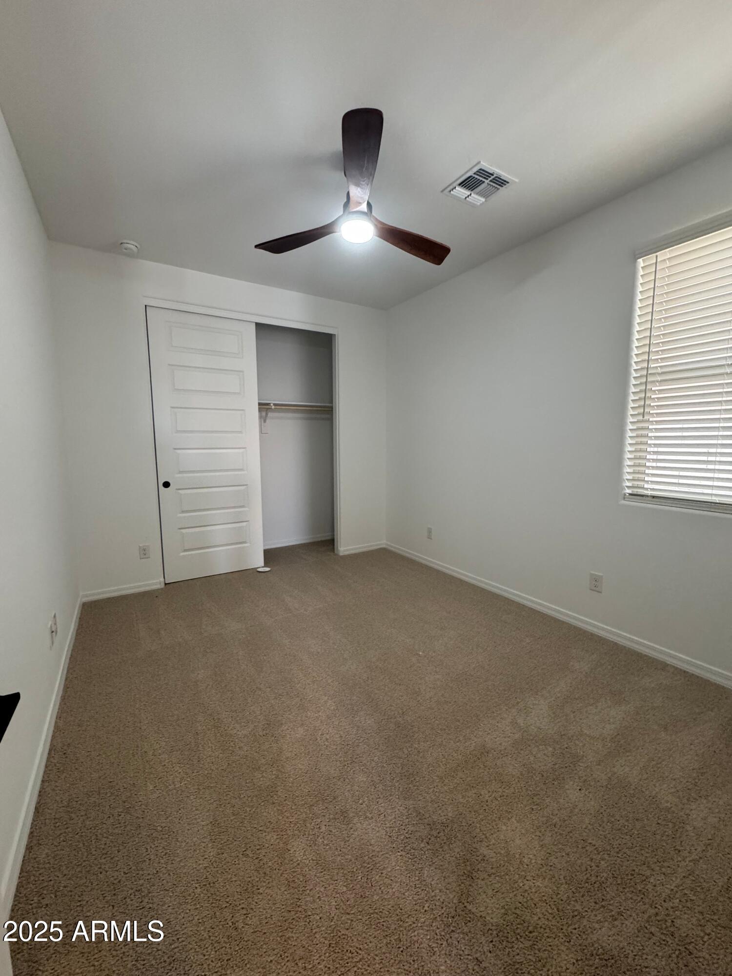 13420 West Eagle Feather Road Peoria, AZ 85383 - Photo 12 of 23 a view of an empty room