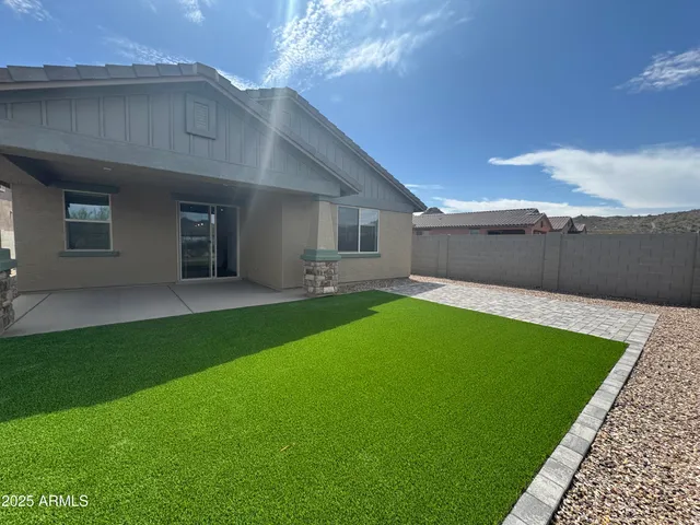 a house view with a garden space