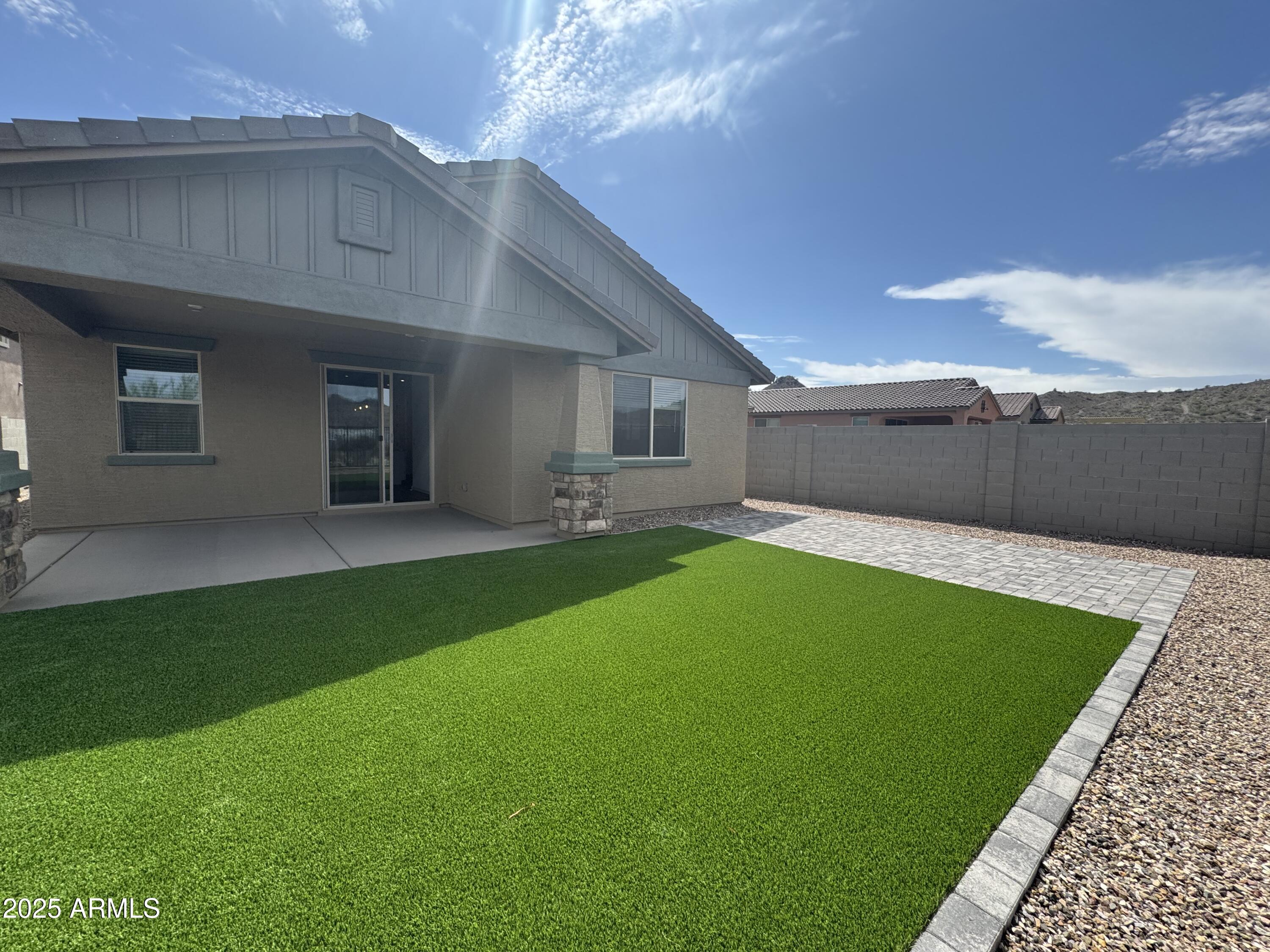 13420 West Eagle Feather Road Peoria, AZ 85383 - Photo 21 of 23 a house view with a garden space