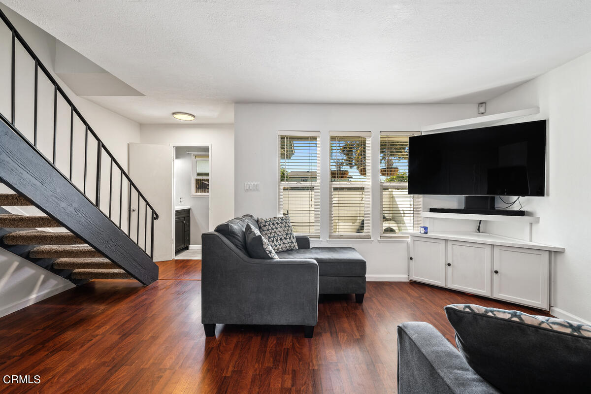 2117 Miramar Walk Oxnard, CA 93035 - Photo 1 of 30 a living room with furniture and a flat screen tv