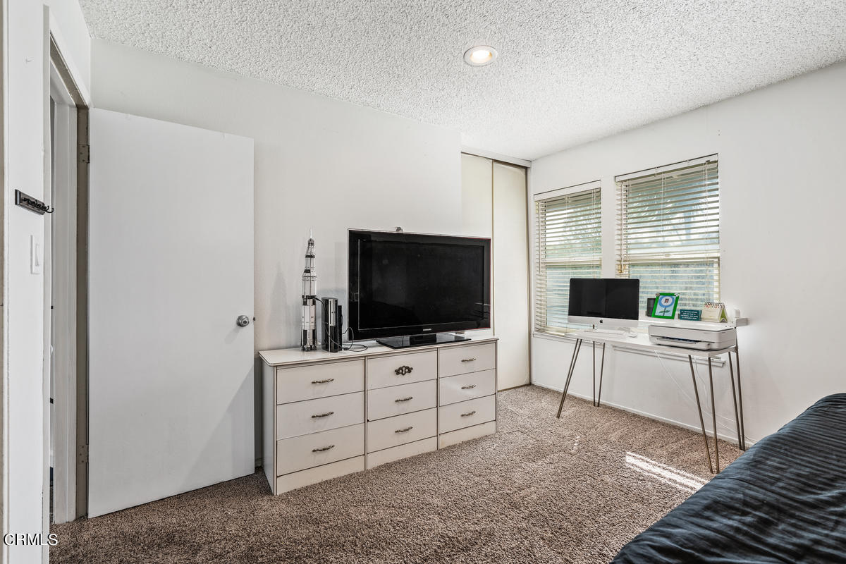 2117 Miramar Walk Oxnard, CA 93035 - Photo 14 of 30 a living room with furniture and flat screen tv