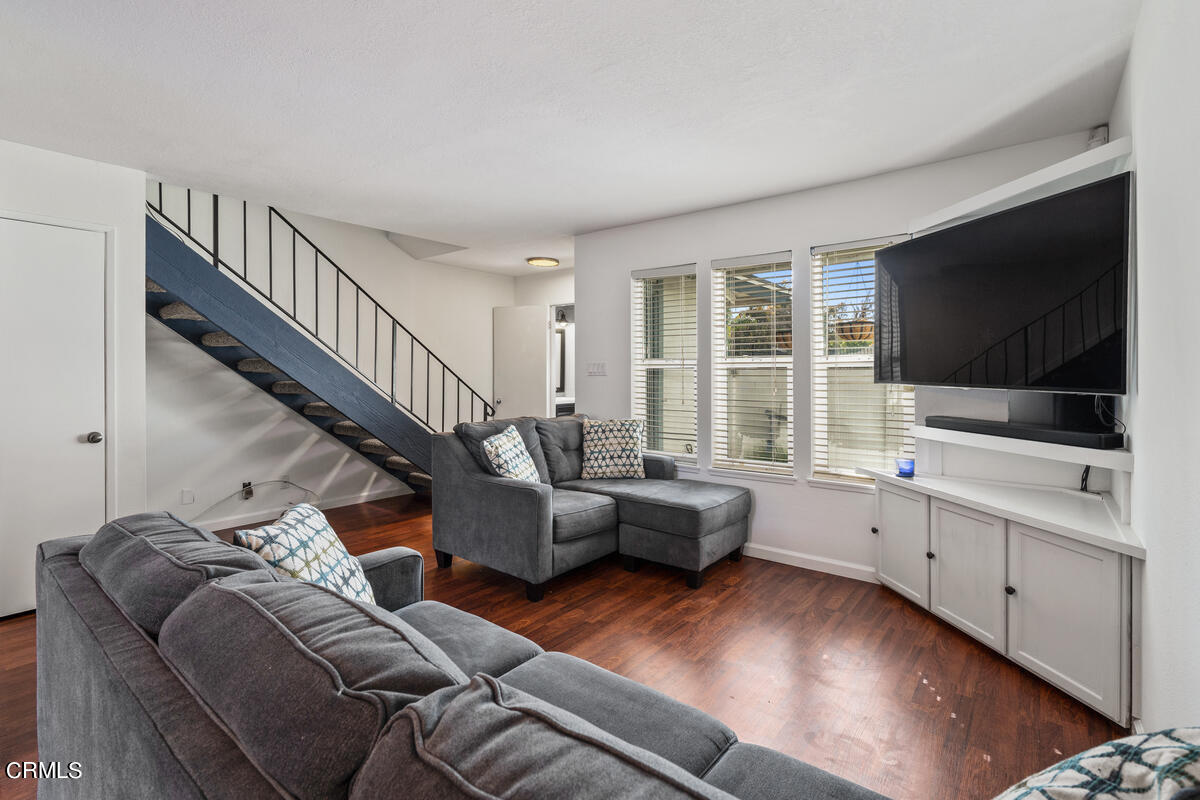 2117 Miramar Walk Oxnard, CA 93035 - Photo 2 of 30 a living room with furniture flat screen tv and windows