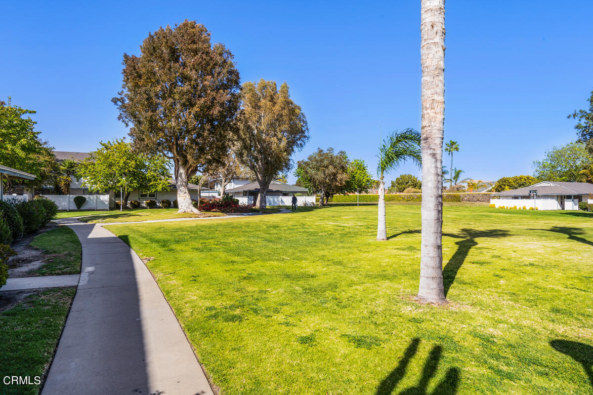 2117 Miramar Walk Oxnard, CA 93035 - Photo 29 of 30 a swimming pool with outdoor seating and garden