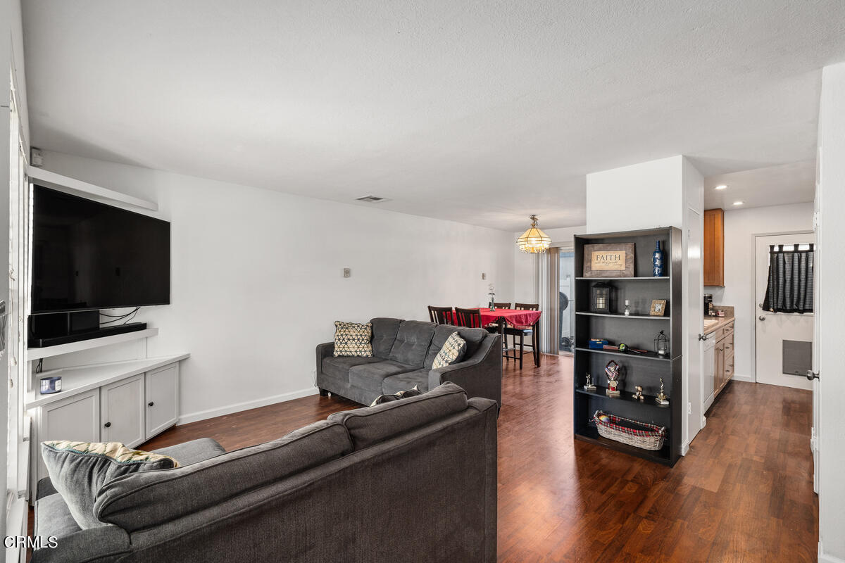 2117 Miramar Walk Oxnard, CA 93035 - Photo 3 of 30 a living room with furniture and a flat screen tv